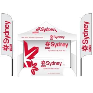 3x3m Printed Marquee with full digital canopy, One (1) 3m digital wall panel, two (2) 3m digtail half wall panels, 1.8m fitted table cover & two (2) 3.7m feather banners